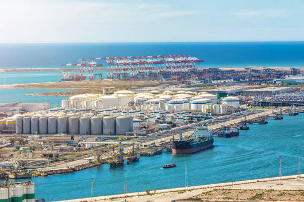 Engineer at terminal at sunset